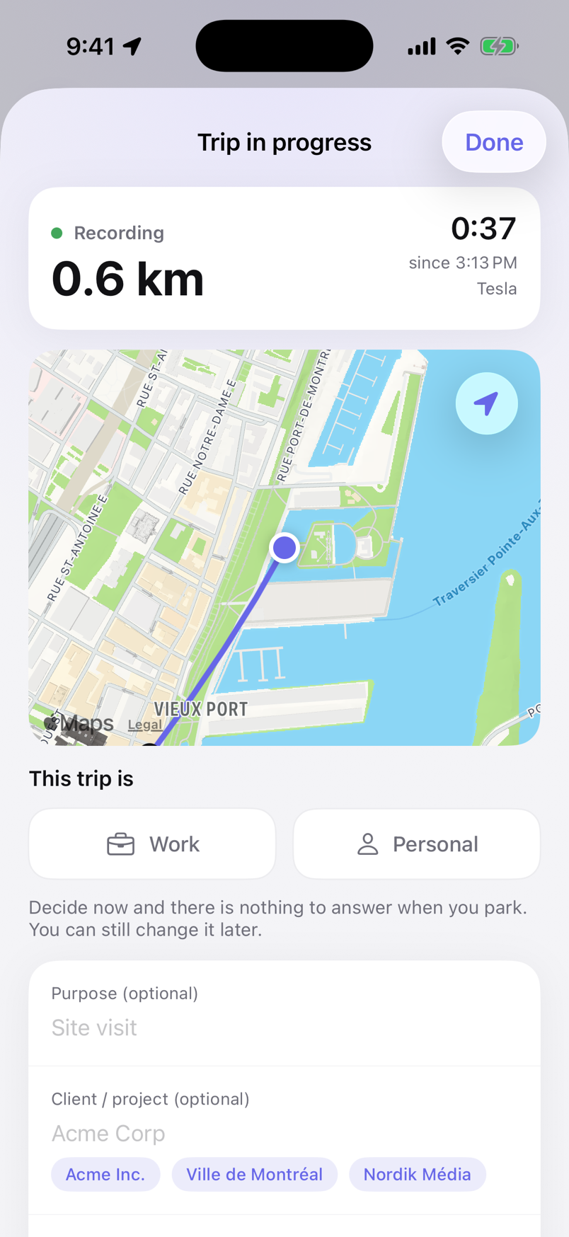 Trip in progress: the route so far on a map, the distance and timer, Work and Personal tiles, and a button to add a receipt.
